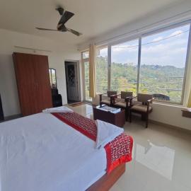 Holidayz by Stayz Royale Munnar - Misty & Sunrise Experience, hotelli kohteessa Munnar