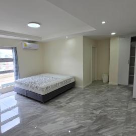 Beachfront House, hotel di Garapan