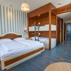 Quadruple Room (2 Adults + 2 Children under 12 Years)