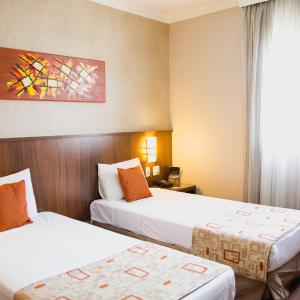 Quarto Superior Class A 2 camas Solteiro e Vista da Cidade