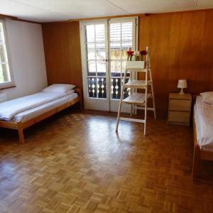 Triple Room with Balcony and shared bathroom