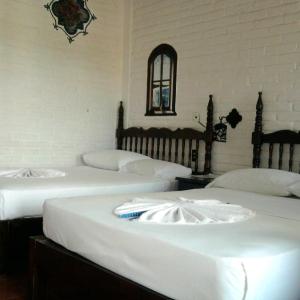 Double Room with Two Double Beds (1-4 Adults)