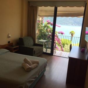 Superior Triple Room with Balcony and Lake View