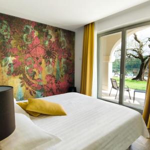 Junior Suite with Patio and Pool View - Ground Floor