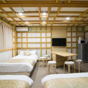 Standard Triple Room (Two Double Beds + One Small Double Bed)