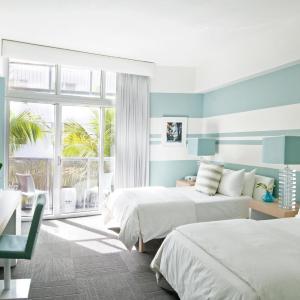 Double Room with Two Double Beds and Partial Ocean View