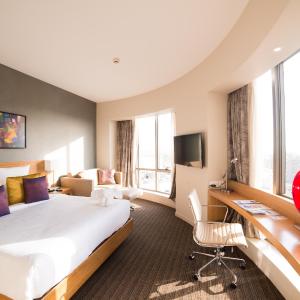 Executive Room | Unlimited IMFL at the Premium Lounge from 6–8 pm, one-way airport transfer, and 20% discounts on F&B, Laundry, Spa, and Transport