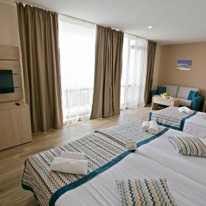 Family Room with Balcony (4 Adults) - Free SPA and Beach Access