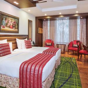 Deluxe Room Twin -  10% Discount on Foods & Soft Beverages* | 15% Discounts on Laundry Services* | Free Mini-bar - 2 cans of soft Beverages (Once on Arrival) | Assorted Snacks in the Room (Once during Stay)