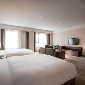 Deluxe Quadruple Room with Two Queen Beds