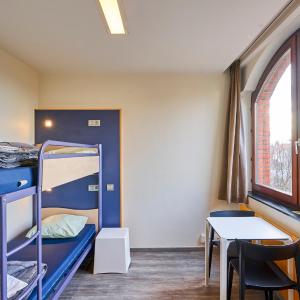 Single Bed in Male Dormitory Room