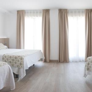 Quadruple Room (2 Adults + 2 Children)
