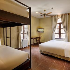 Family Deluxe Room with One King Bed and One Single Bed