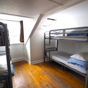 Bed in 8-Bed Mixed Dormitory Room with Shared External Bathroom