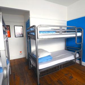 Bed in 4-Bed Mixed Dormitory Room with Shared Bathroom