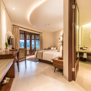 Suite with Balcony, Free Scheduled Shuttle to Ubud, Free Photo Session with Free 1 Digital Photo, 24 Hours e-butler Service, Buggy Service throughout the Resort and Free Resort Activities