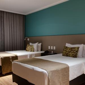 Quarto Executivo com 2 camas de Solteiro