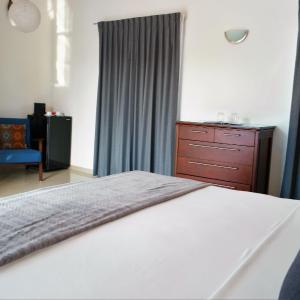 King Suite with Private Terrace and Pool View. 