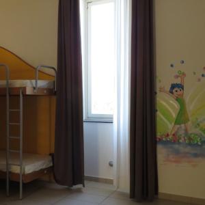Single Bed in Female Dormitory Room