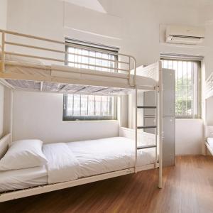 Bed in 6-Bed Female Dormitory Room