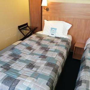 Triple Room with 2 Single Bed and 1 Junior Bed