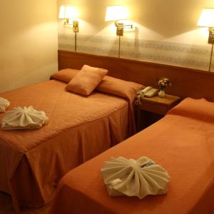 Triple Room (2 Adults + 1 Child)