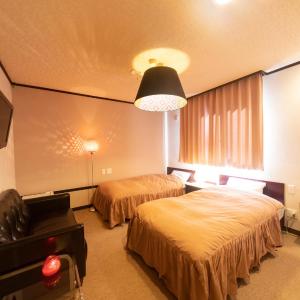 Twin Room with Private Bathroom and Toilet