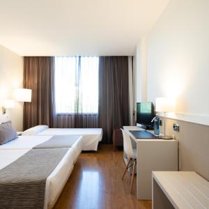 Triple Room (2 Adults + 1 Child)
