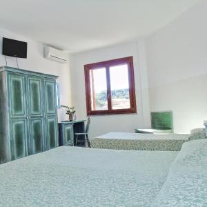 Quadruple Room with Balcony