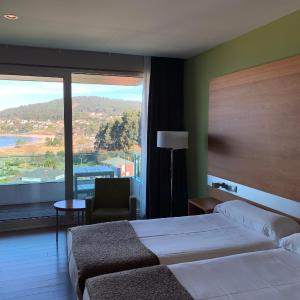 Double or Twin Room with Terrace and Sea View