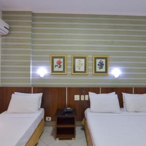 Quadruple Room (4 single beds)