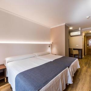 Quadruple Room (2 Adults + 2 Children)