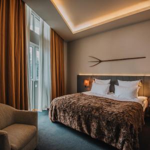 Two-Bedroom Suite with Balcony and Spa Access - Corp Grand Hotel