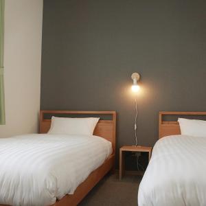 Twin Room with Shared Bathroom - Non-Smoking