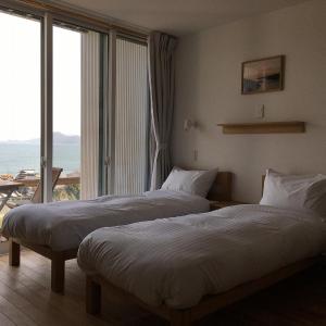 Superior Twin Room with Terrace and Sea View 