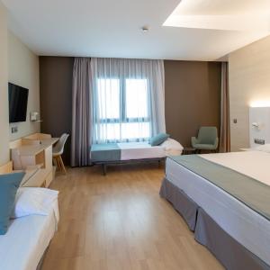Quadruple Room (2 Adults + 2 Children)