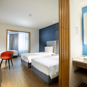 Standard Room with One Queen Bed and Twin Beds