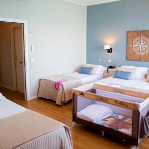 Quadruple Room with Balcony and Sea View
