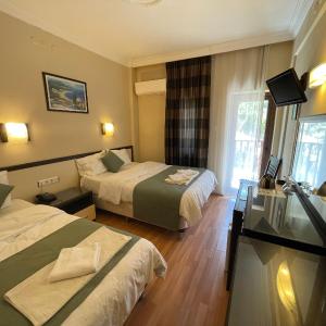 Double Room with Balcony (2 Adults + 1 Child)