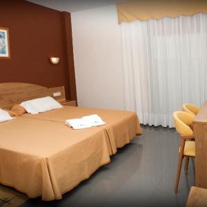 Triple Room (2 Adults + 1 Child)