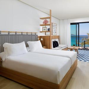 Junior Suite with Terrace and Sea View (3 Adults + 1 Child up to 11 years old)