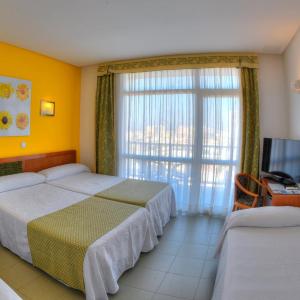 Double Room with Two Extra Beds with Spa Access (3 Adults+1Child)