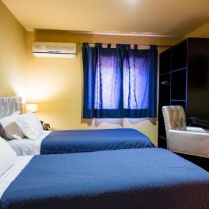 Triple Room (1 Double Bed + 1 Single Bed)
