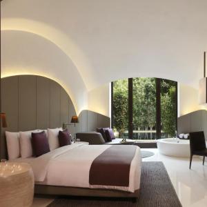 The Roseate Lake Access Suite with Hi-Tea (16:30 to 17:30 Hrs), Both way airport transport, 15 % discount on Spa, Laundry and Car Services