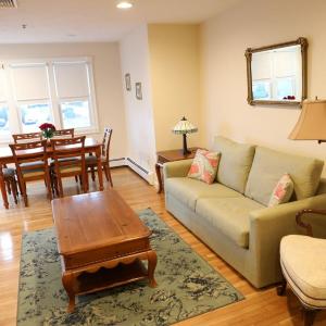 Two-Bedroom Suite with Kitchen, Balcony, and Partial Ocean View – 2A