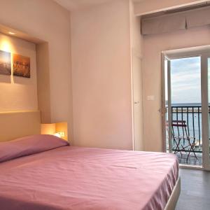 Quadruple Room with Balcony and Sea View