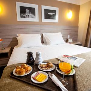 Premium Double - 1 King Bed and 1 Sofa bed