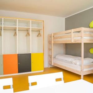 Bed in 4-Bed Dormitory Room with Shared Bathroom