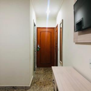 Quarto com 1 Cama de Casal Queen e 1 Cama de Solteiro