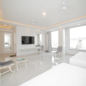 Deluxe Family Suite with 10% off on Two-way Airport/Railway/Bus Transfer and 20% Off on Laundry service for upto 2 clothing items